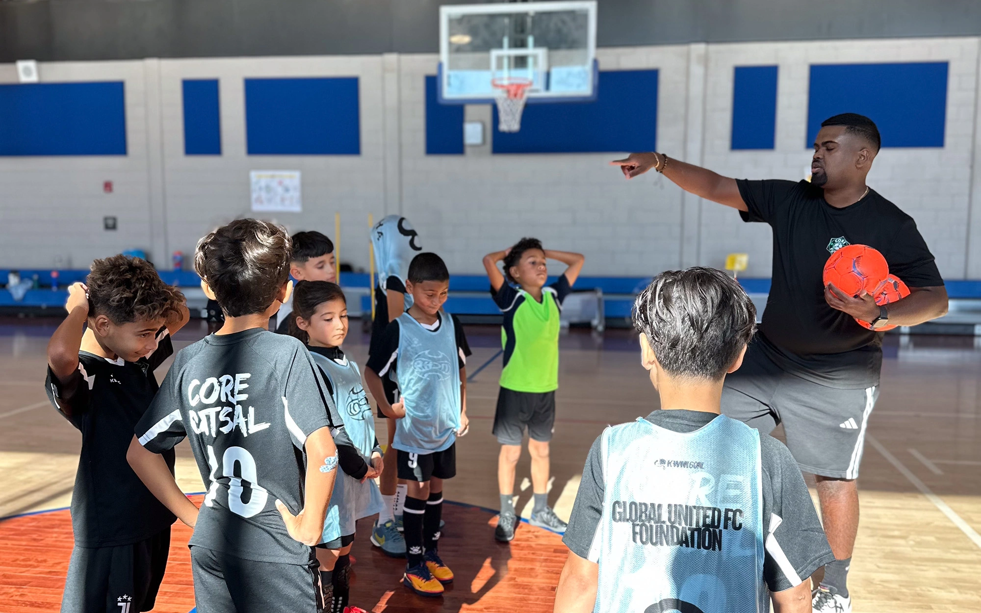 Coaching staff with players