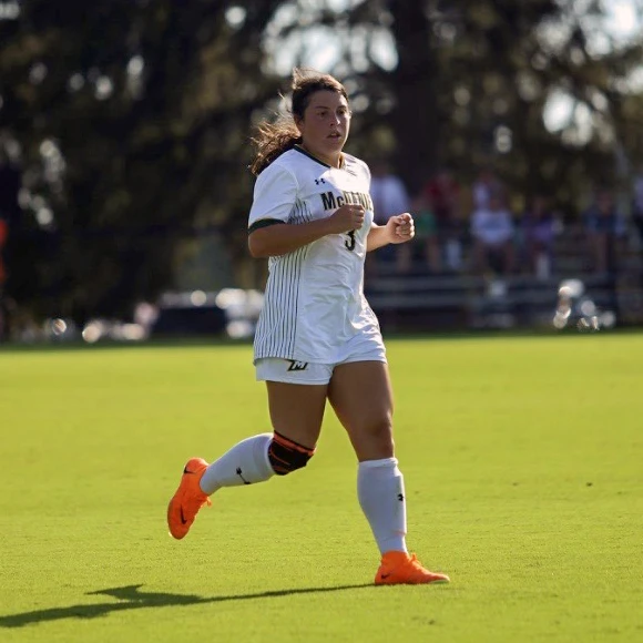 Coach Elena Hincapié